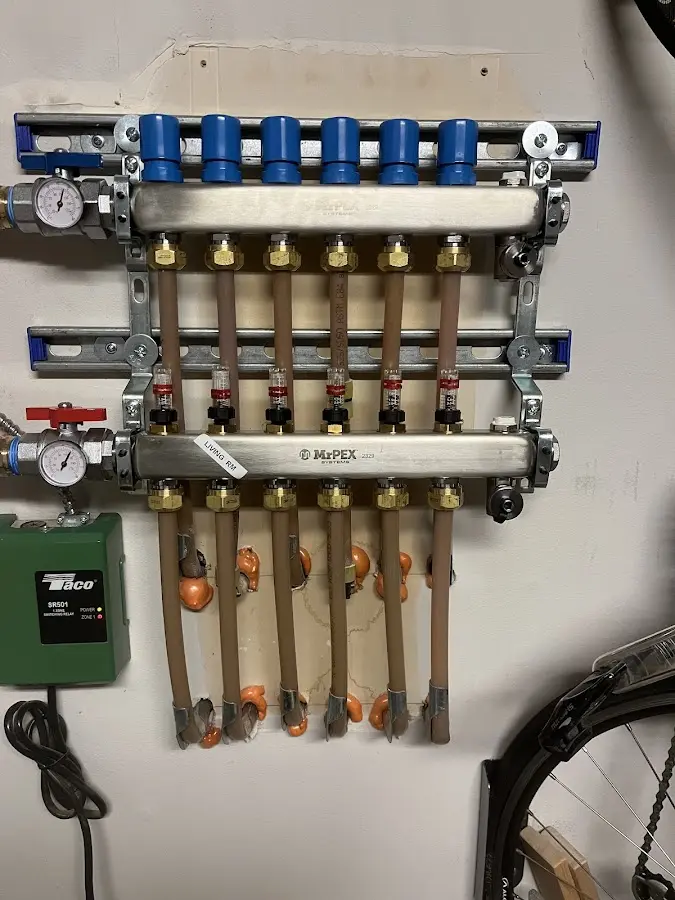 Plumber performing Leak Detection at a residential property in Wixom